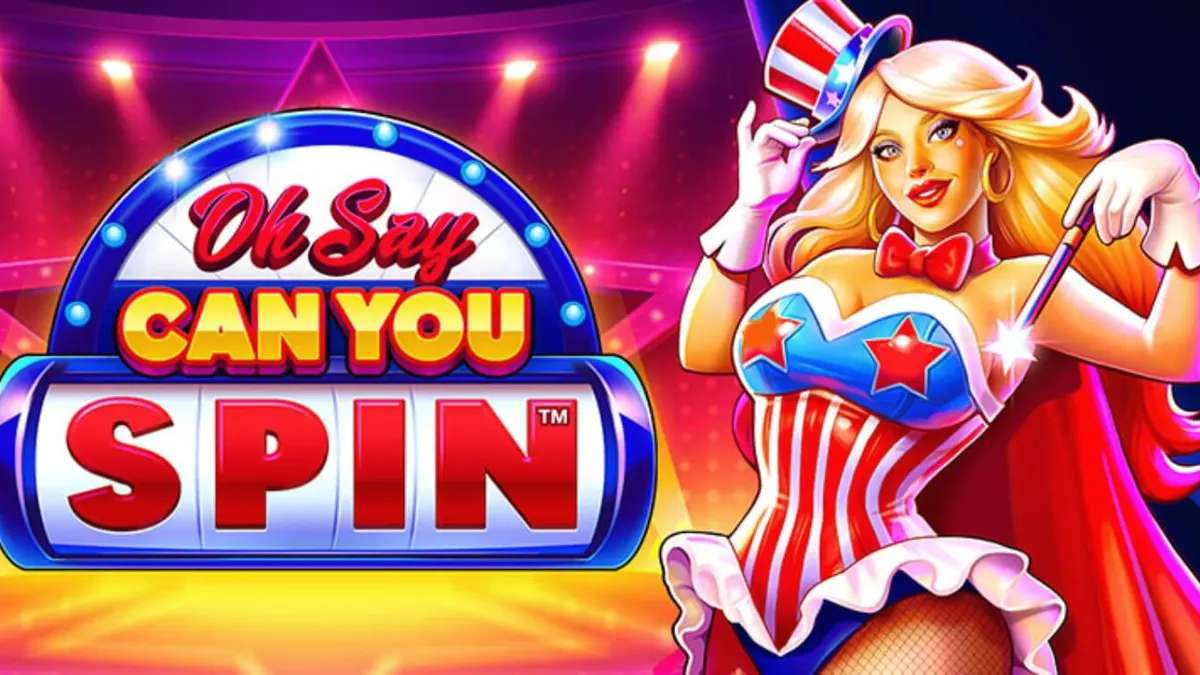 Tampilan visual slot Oh Say Can You Spin dengan tema patriotik dan lampu panggung yang meriah.